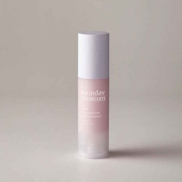 Monday Museum Pink Inspiration Cream Drop 30ml tube with pink label skincare product on white background